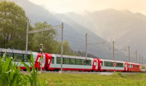 Glacier Express: A legendary train journey through the Swiss Alps, showcasing stunning landscapes, glaciers, and picturesque valleys, offering an unparalleled panoramic experience