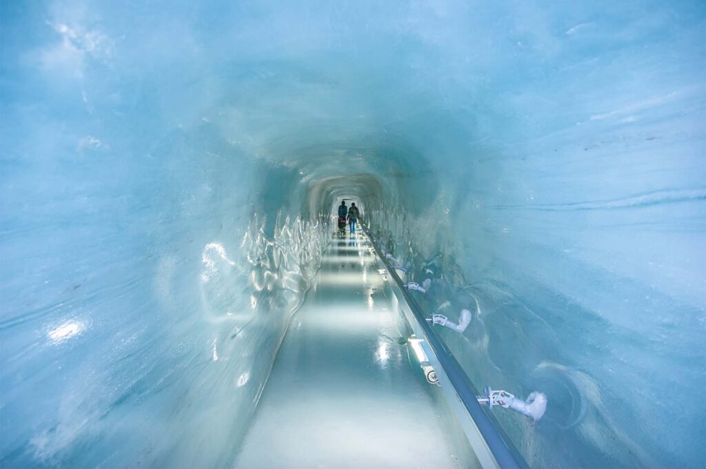 Majestic Jungfraujoch Ice Palace in Switzerland - Explore the Magical World of Ice and Sculpted Artwork