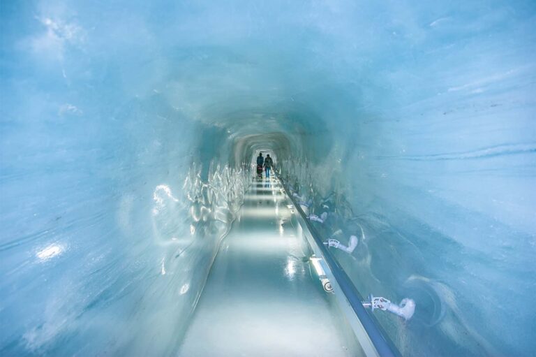 Majestic Jungfraujoch Ice Palace in Switzerland - Explore the Magical World of Ice and Sculpted Artwork