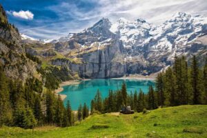 Scenic Oeschinensee in Switzerland - Enjoy the Serenity and Beauty of the Alpine Lake Amidst Majestic Mountains"