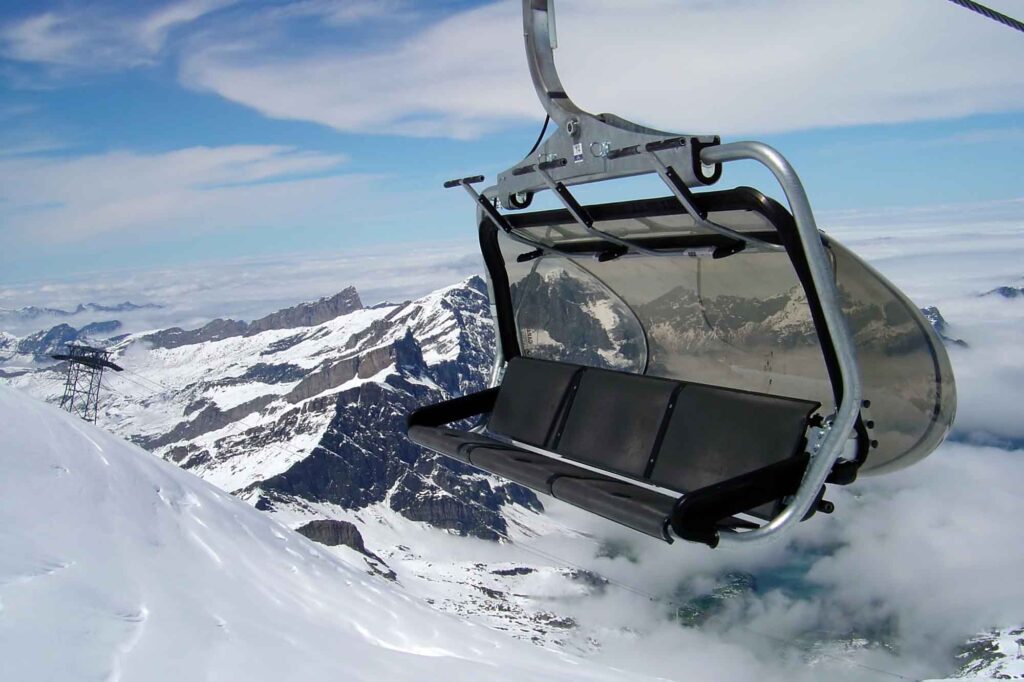Exciting Titlis Ice Flyer in Switzerland - Glide Above the Majestic Glacier Scenery of the Swiss Alps