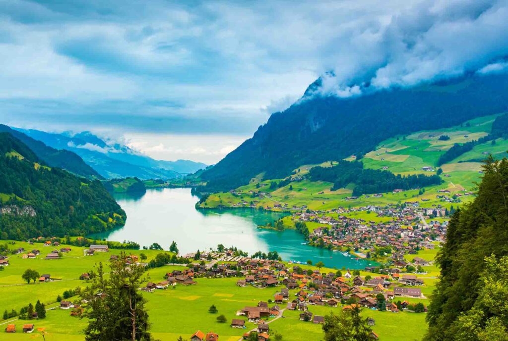 Interlaken: A breathtaking Swiss town nestled between two stunning lakes, offering panoramic views of the Alps and a gateway to adventure.