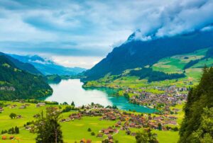 Interlaken: A breathtaking Swiss town nestled between two stunning lakes, offering panoramic views of the Alps and a gateway to adventure.