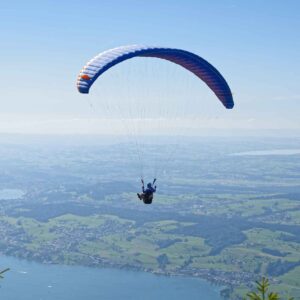 Adventurous paragliding experience over the picturesque landscapes of Zurich, Switzerland