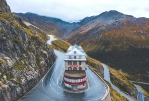 Furka Pass: A scenic mountain pass in the Swiss Alps, offering panoramic views of snow-capped peaks and winding alpine roads.