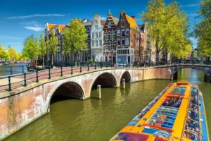 Amsterdam Canal Cruise: A scenic boat journey through the picturesque canals of Amsterdam, offering a unique perspective of the city's historic architecture and cultural landmarks.