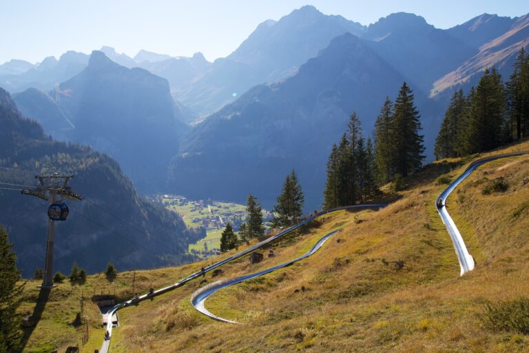 Grindelwald Pfingsten Rodelbahn: A thrilling ride down the alpine toboggan run, surrounded by the stunning landscapes of Grindelwald, Switzerland.
